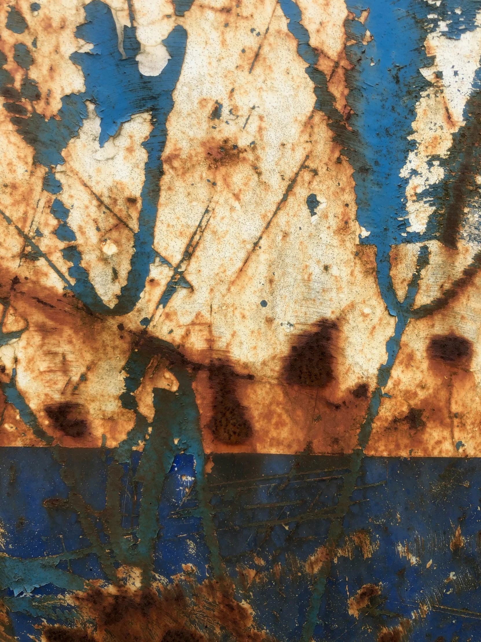 rusted paint smeared with blue, and brown color