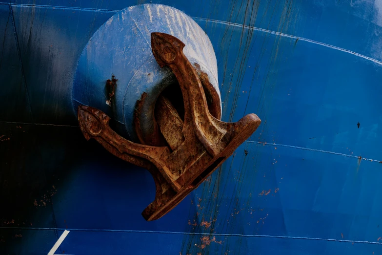 a wooden decoration is shown on the side of a boat