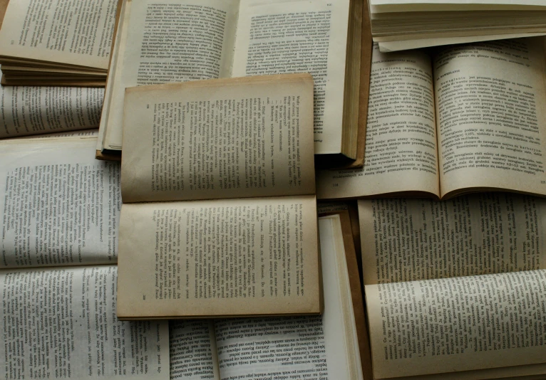 old books laying down on top of each other