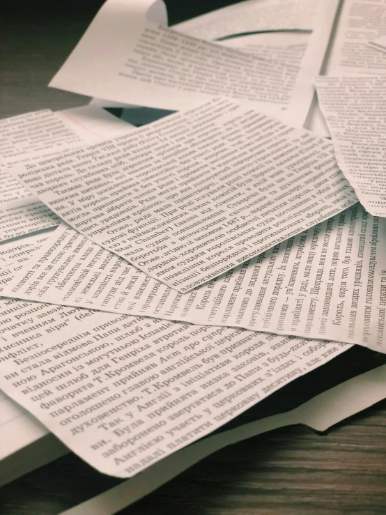 a pile of papers that are next to each other