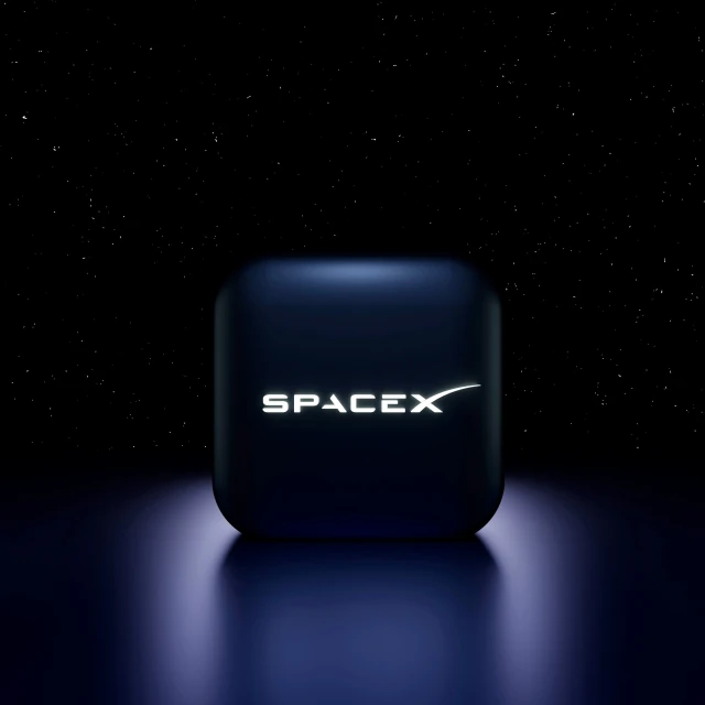 spacex logo glowing on an illuminated surface