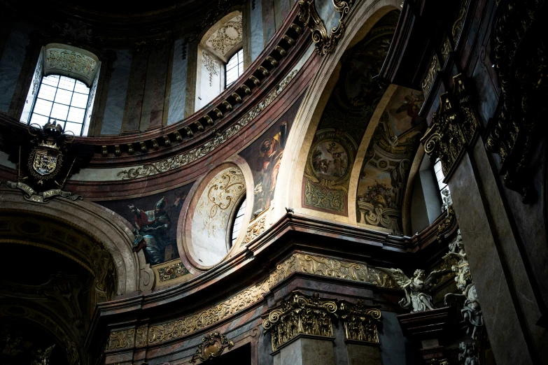 a picture of an old building, with the stained glass and gold detailing