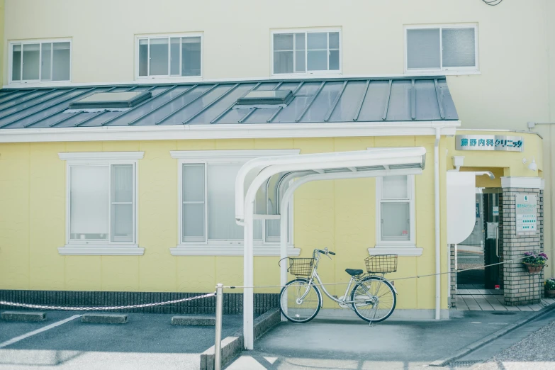 a bike is parked in front of a building