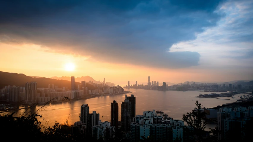 a large body of water sitting below a city