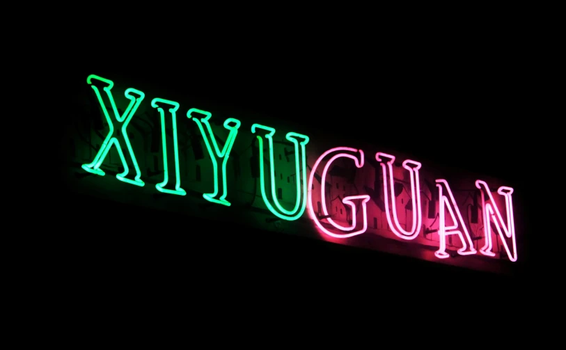 neon sign with word and colors displayed for viewing