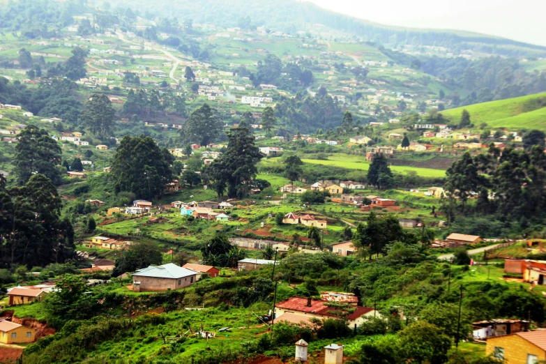 houses built in the mountainside near a mountain village