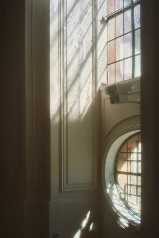 sunlight coming in through windows onto a balcony