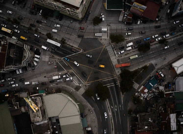 an overhead view of some street and a train