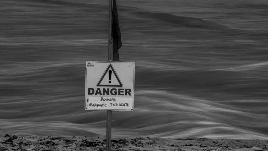 a danger sign for an area that is completely covered by waves