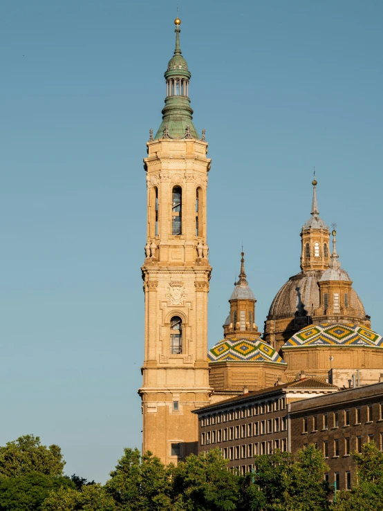 a tall building with a clock tower and two sky scrs