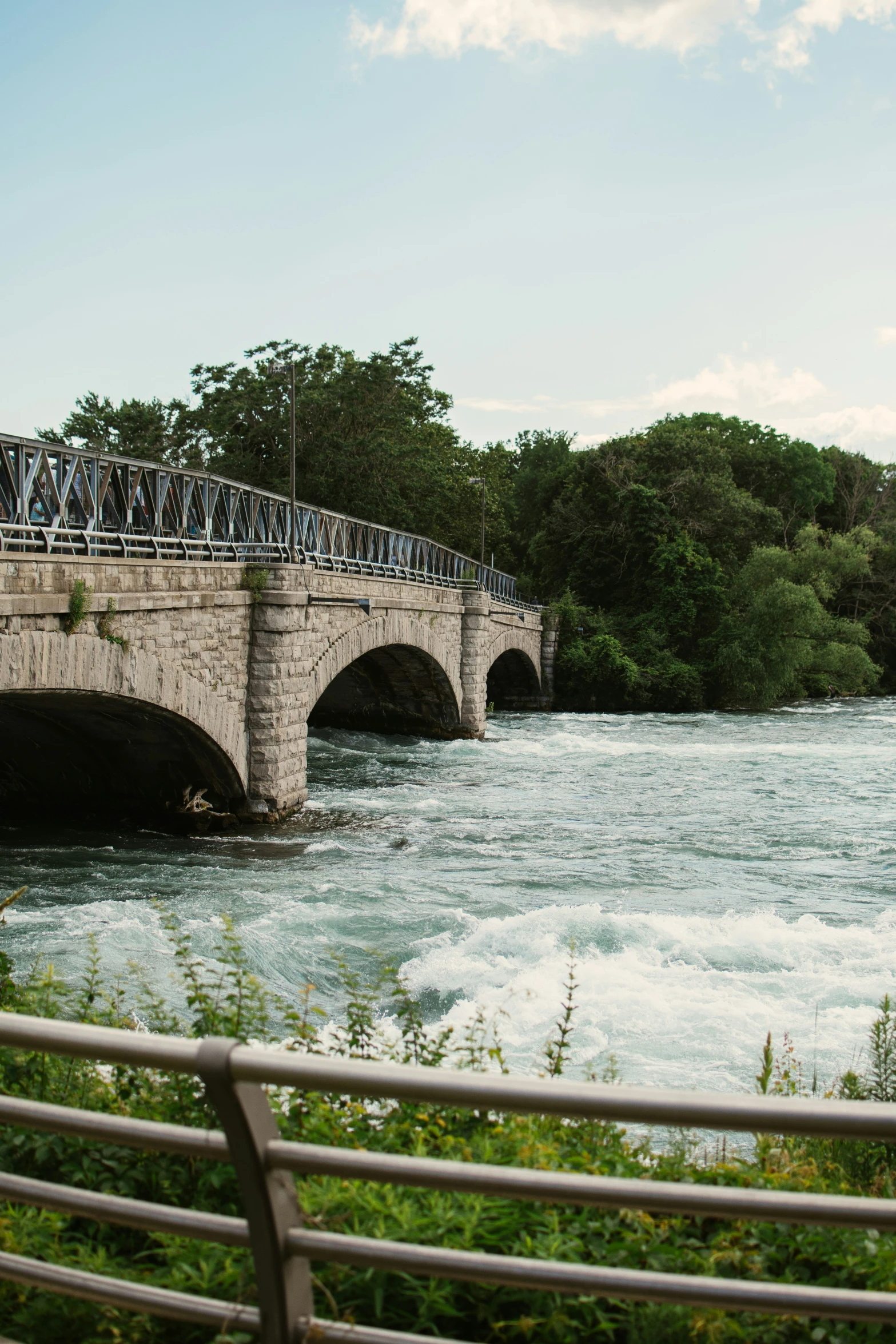 a bike on the bridge going over water