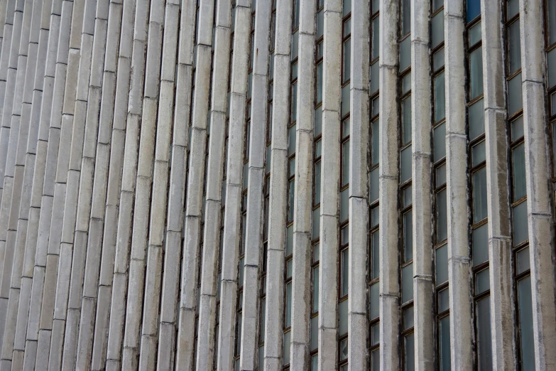 a brick wall with a number of different sized tiles