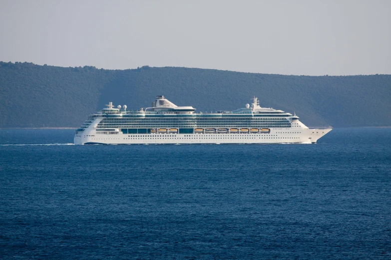 large cruise ship heading out in the open water