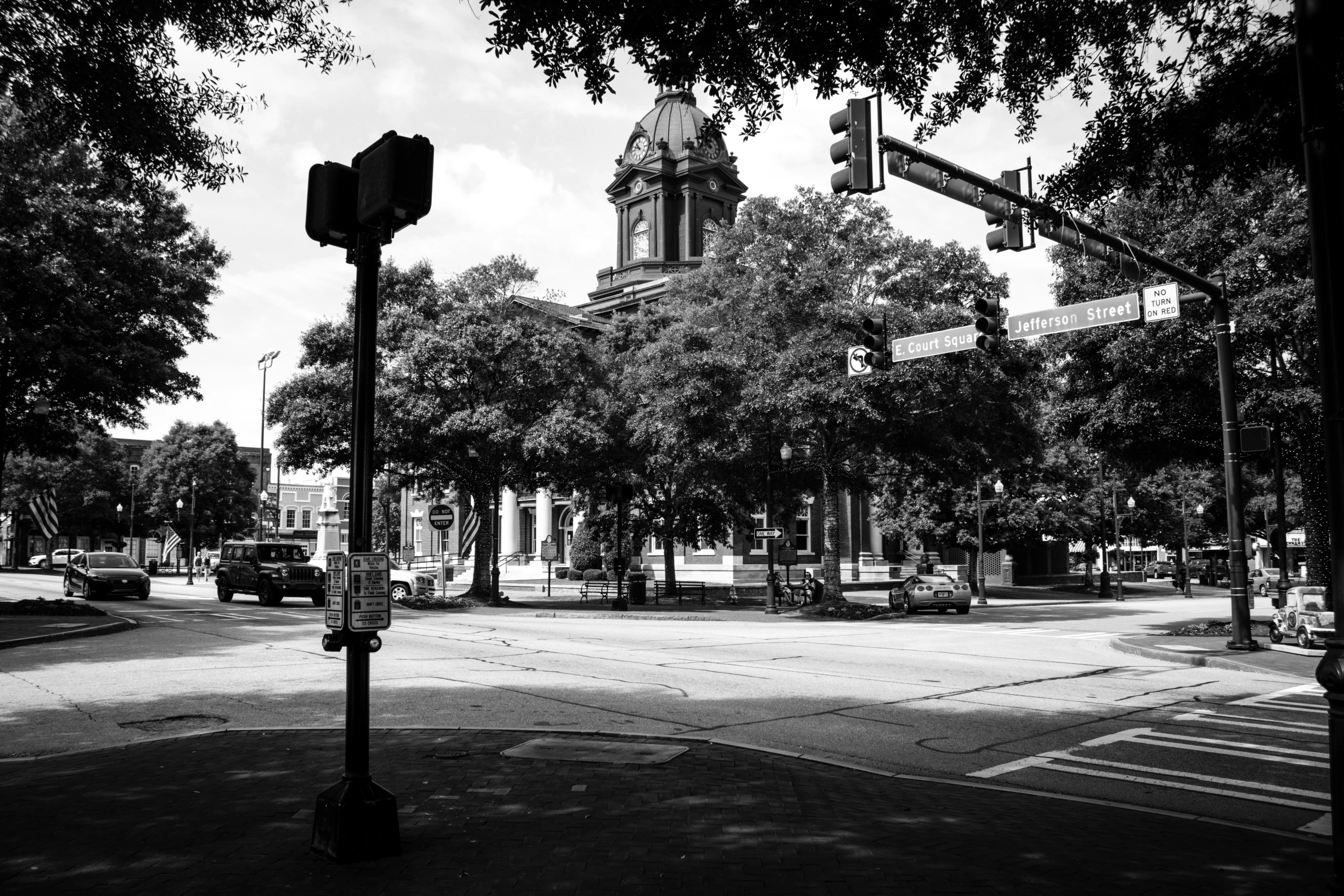 a black and white po of a city street