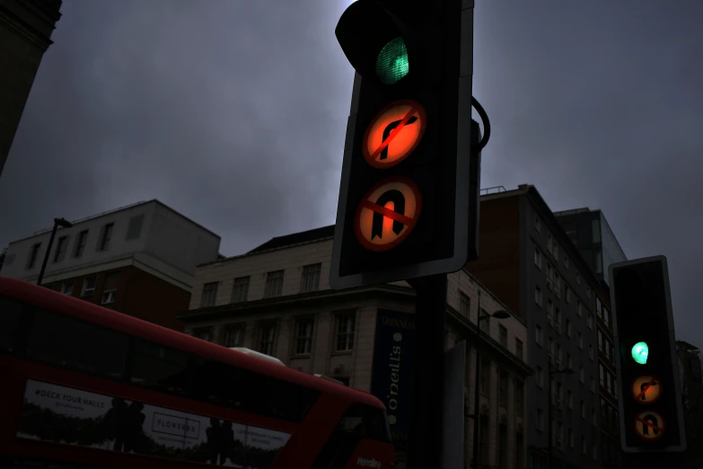 traffic light on pole outside during cloudy day