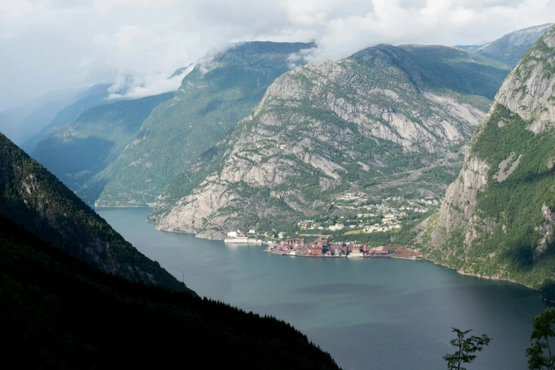 a view of some very tall mountains and a harbor