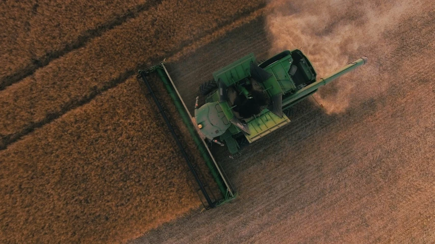 aerial view of grain farmer equipment on farmland
