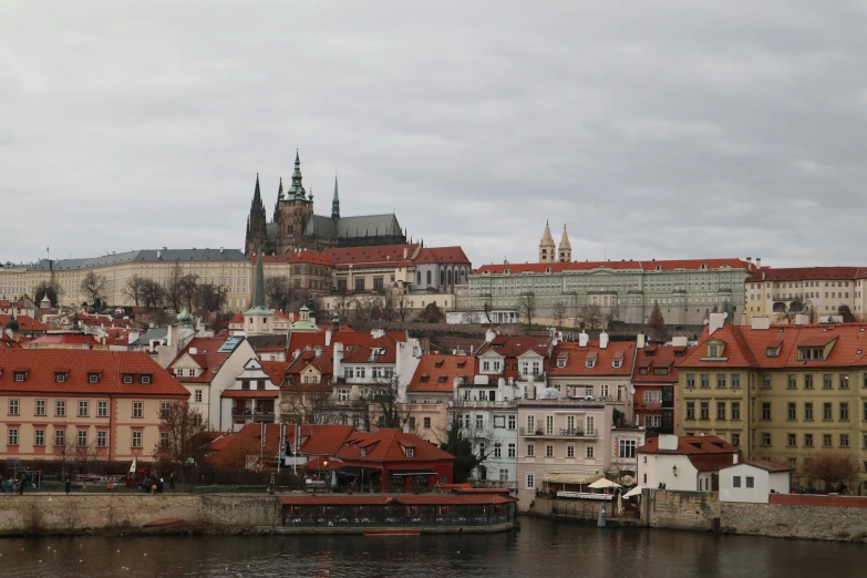 an overview of many different colored buildings in a city