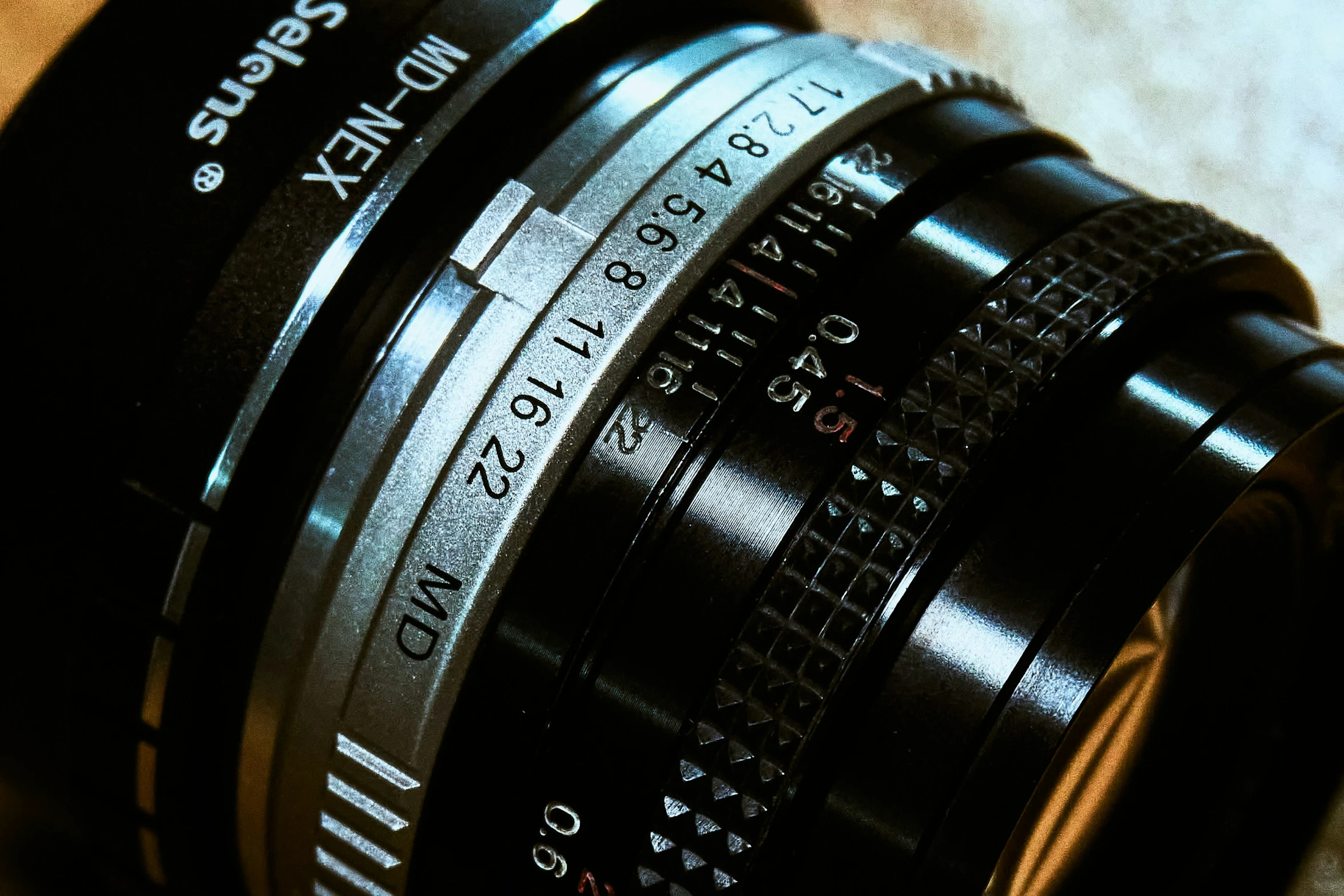 a closeup of a camera lens and its lens cap