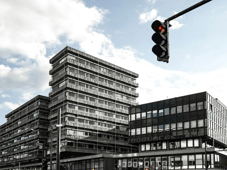 large office building with various levels under street lights