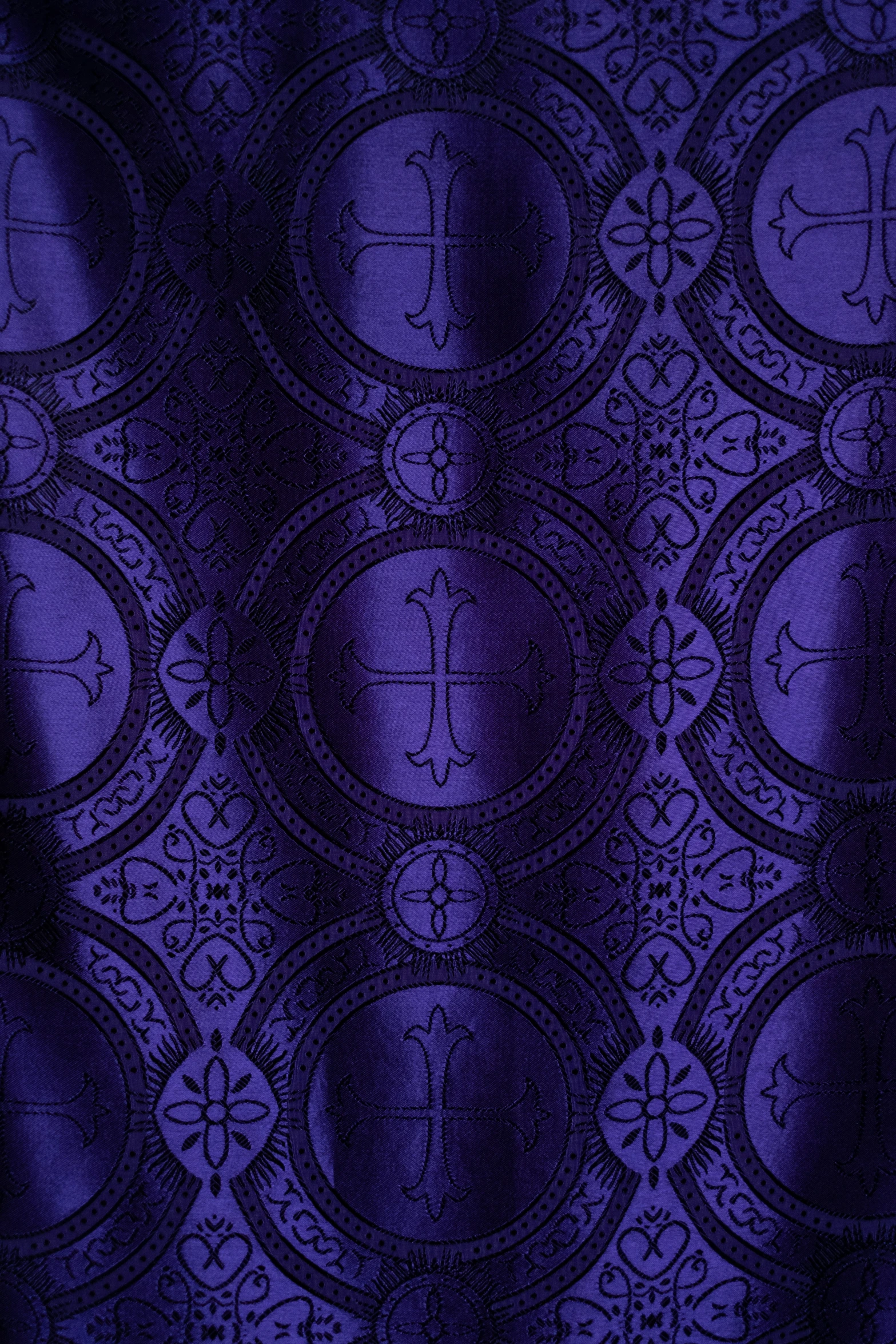 an intricately designed fabric in purple