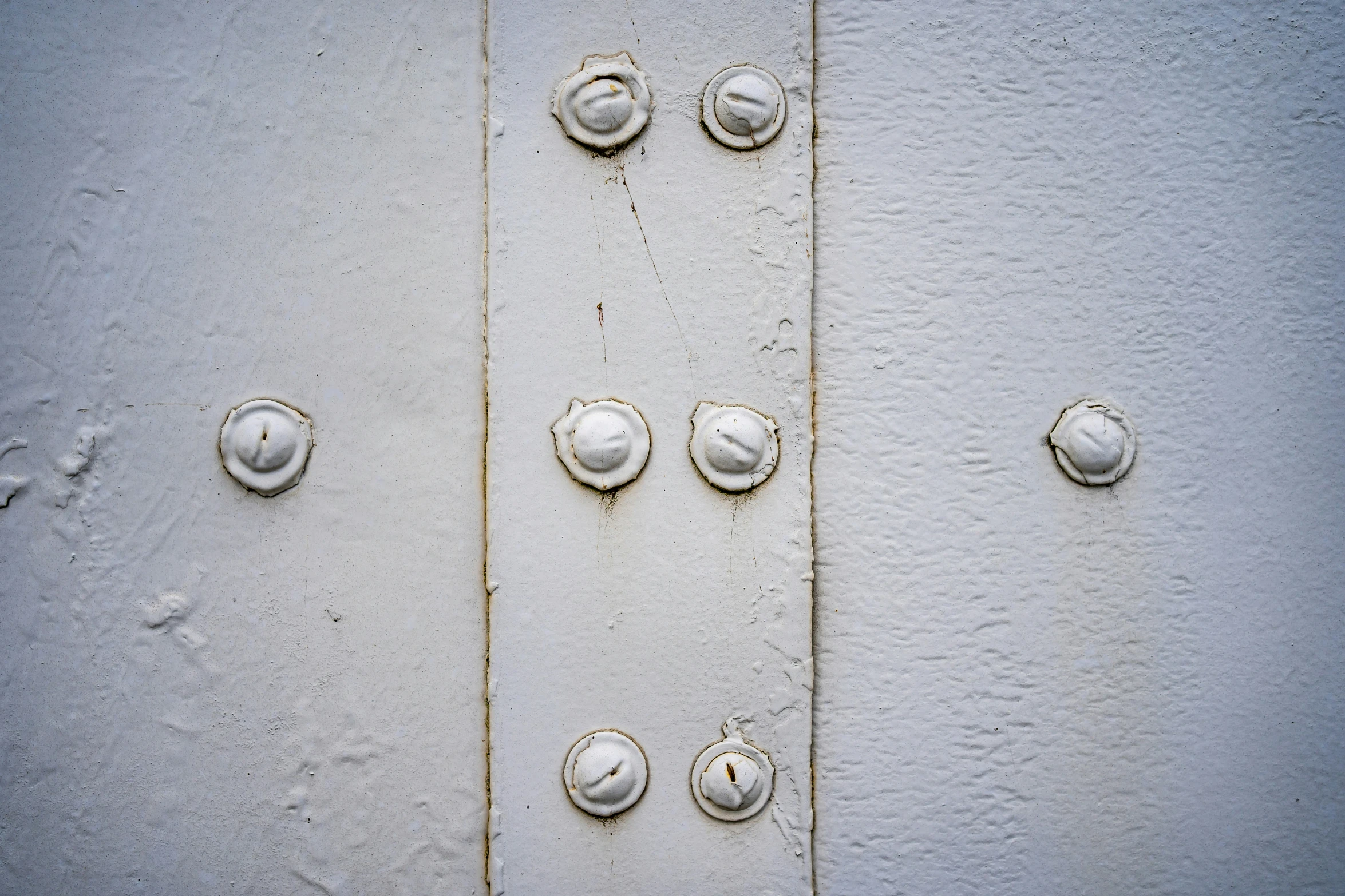 an assortment of metal s are on the wall