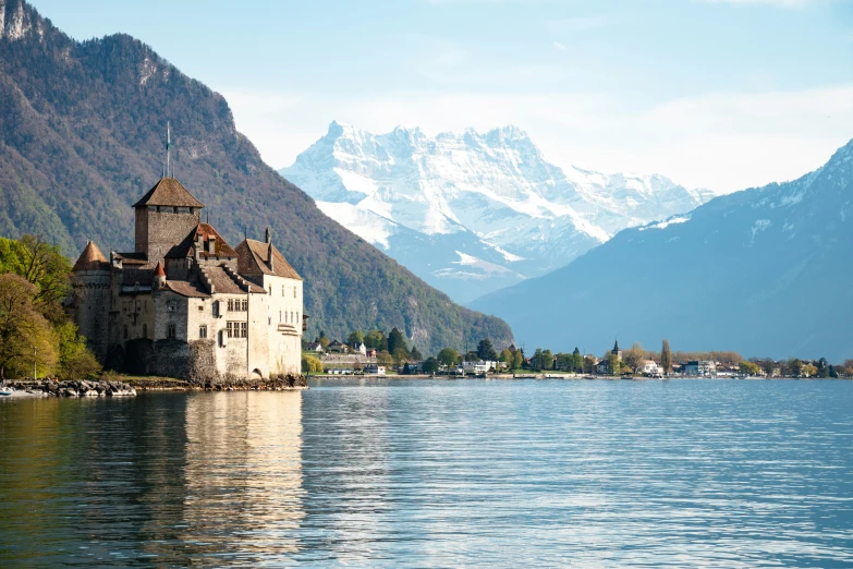 this is an old castle sits in the middle of a lake