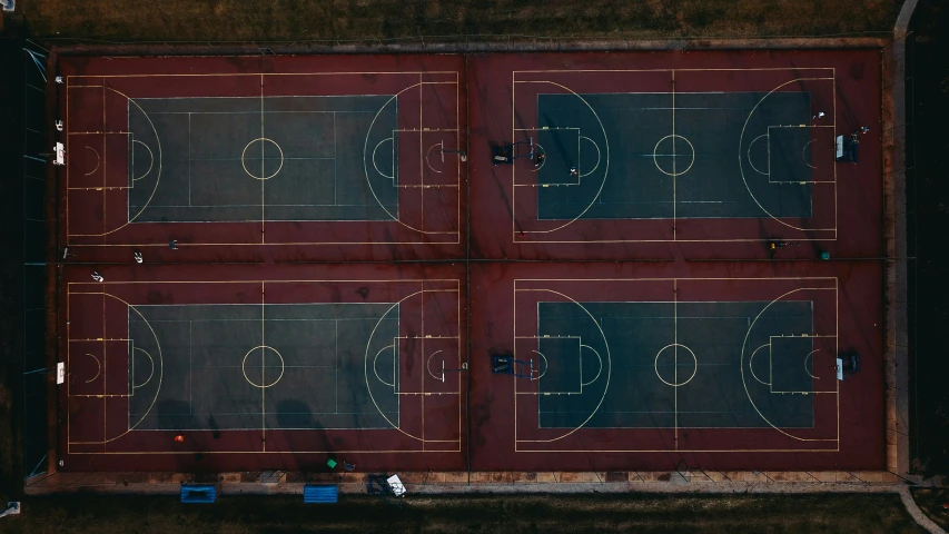 overhead view of basketball courts in an abandoned parking lot