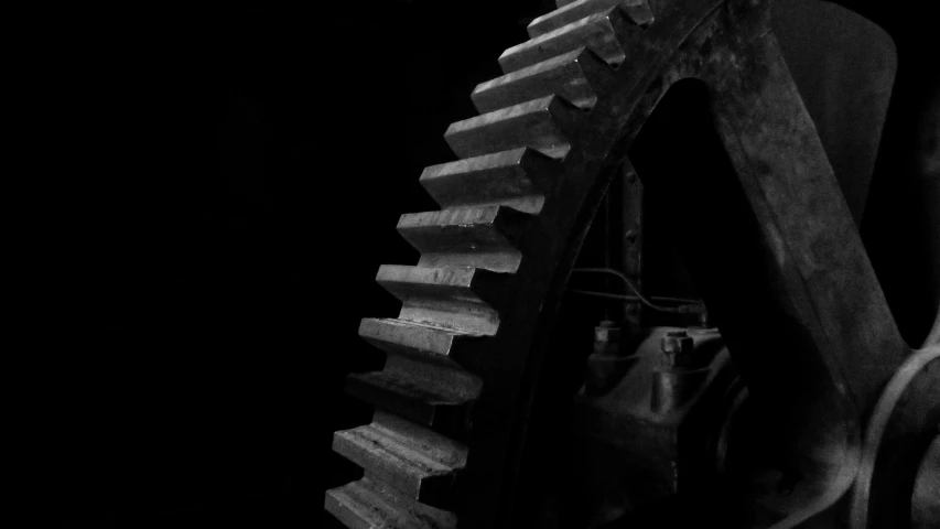 a close up of an old clock gear