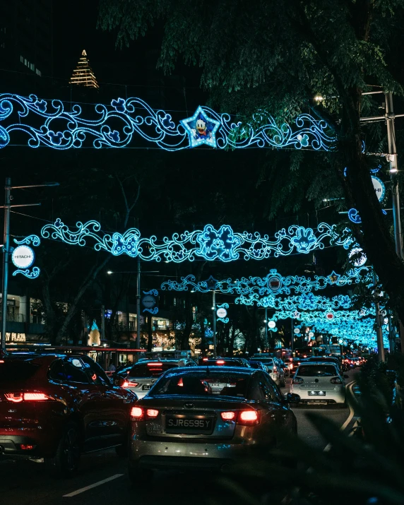 an image of a lit up street in the evening