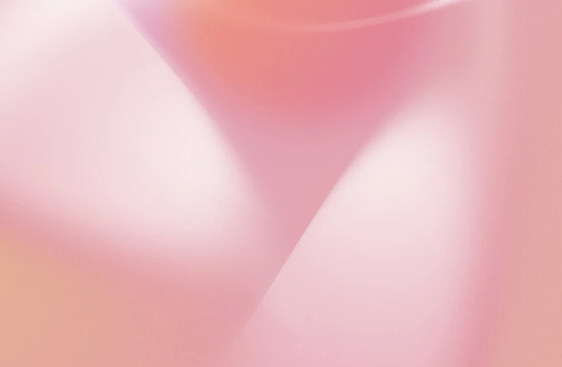 a closeup of the surface of a pink background