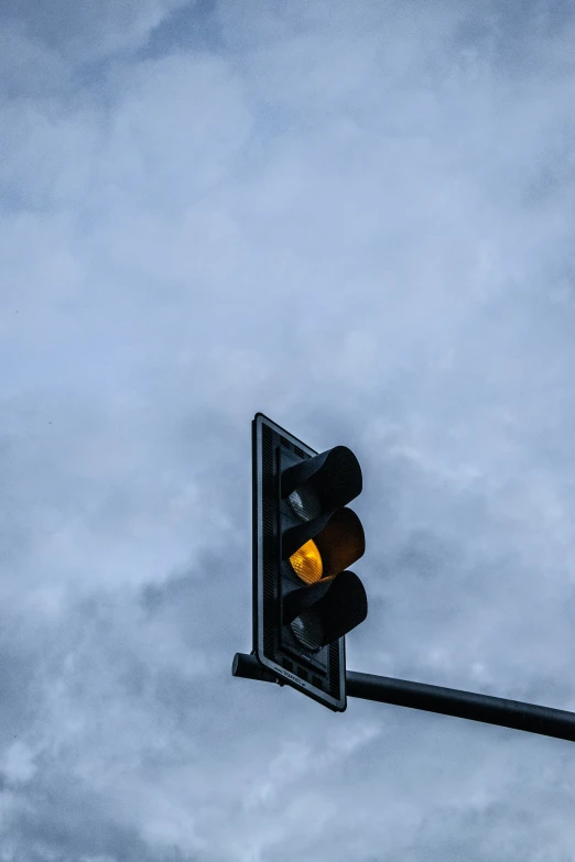 a close up of a stoplight at an intersection