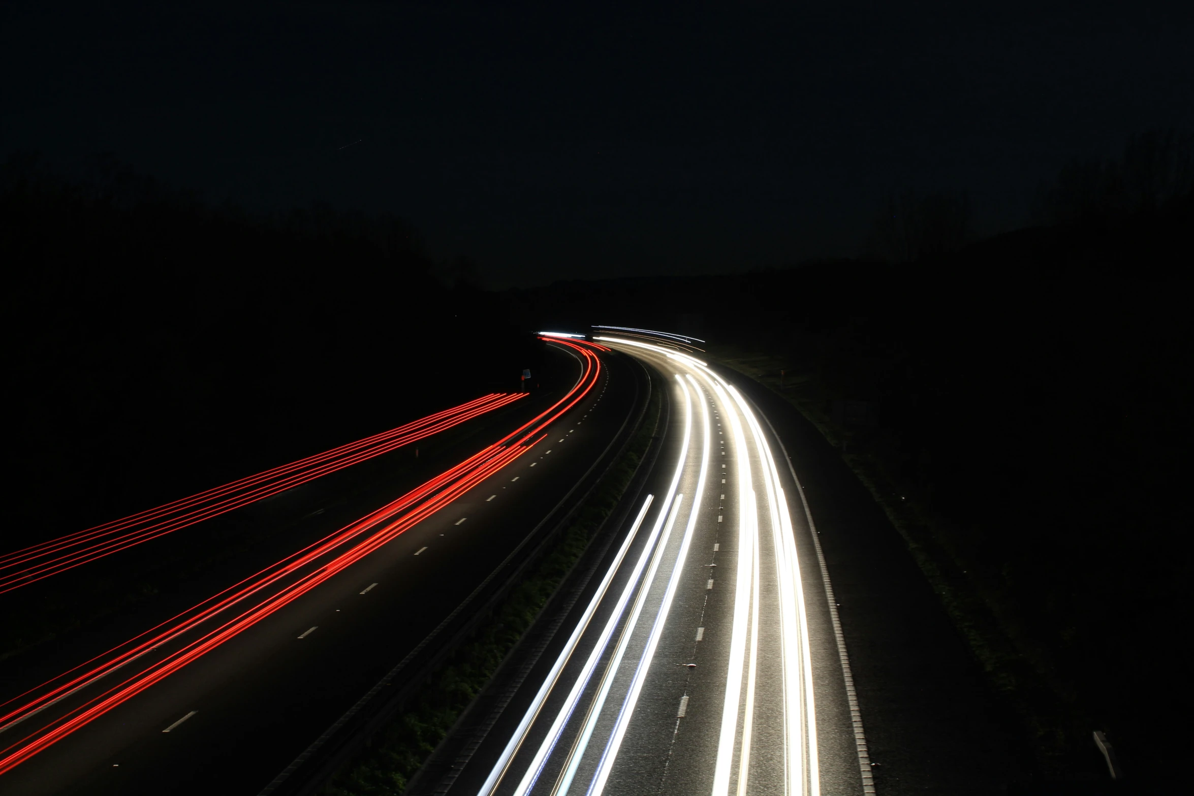 a long exposure po of an interstate at night