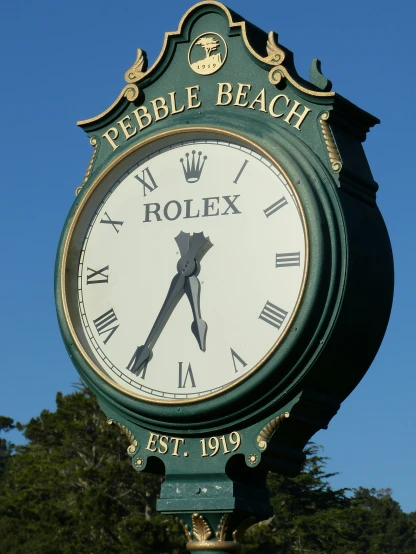 an advertit sign for the rolex public clock
