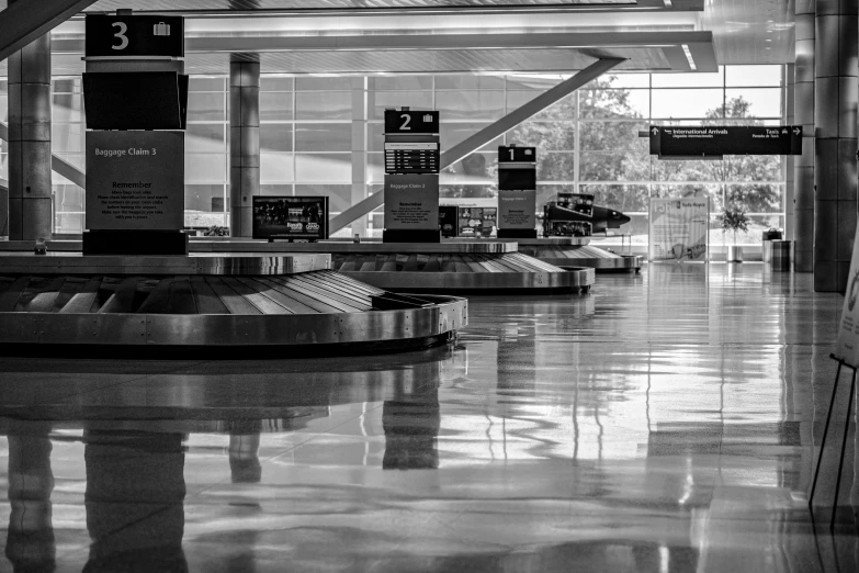 airport luggage carousels line up at the check in area