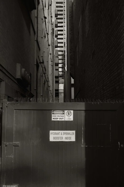 a city street lined with tall buildings and signs