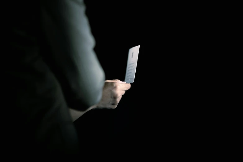 a person holding a knife in their left hand