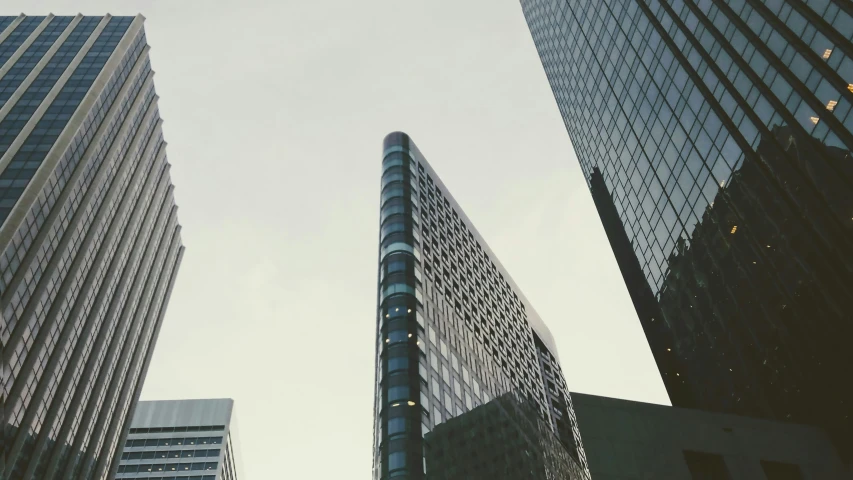 a view of buildings in the city from the ground