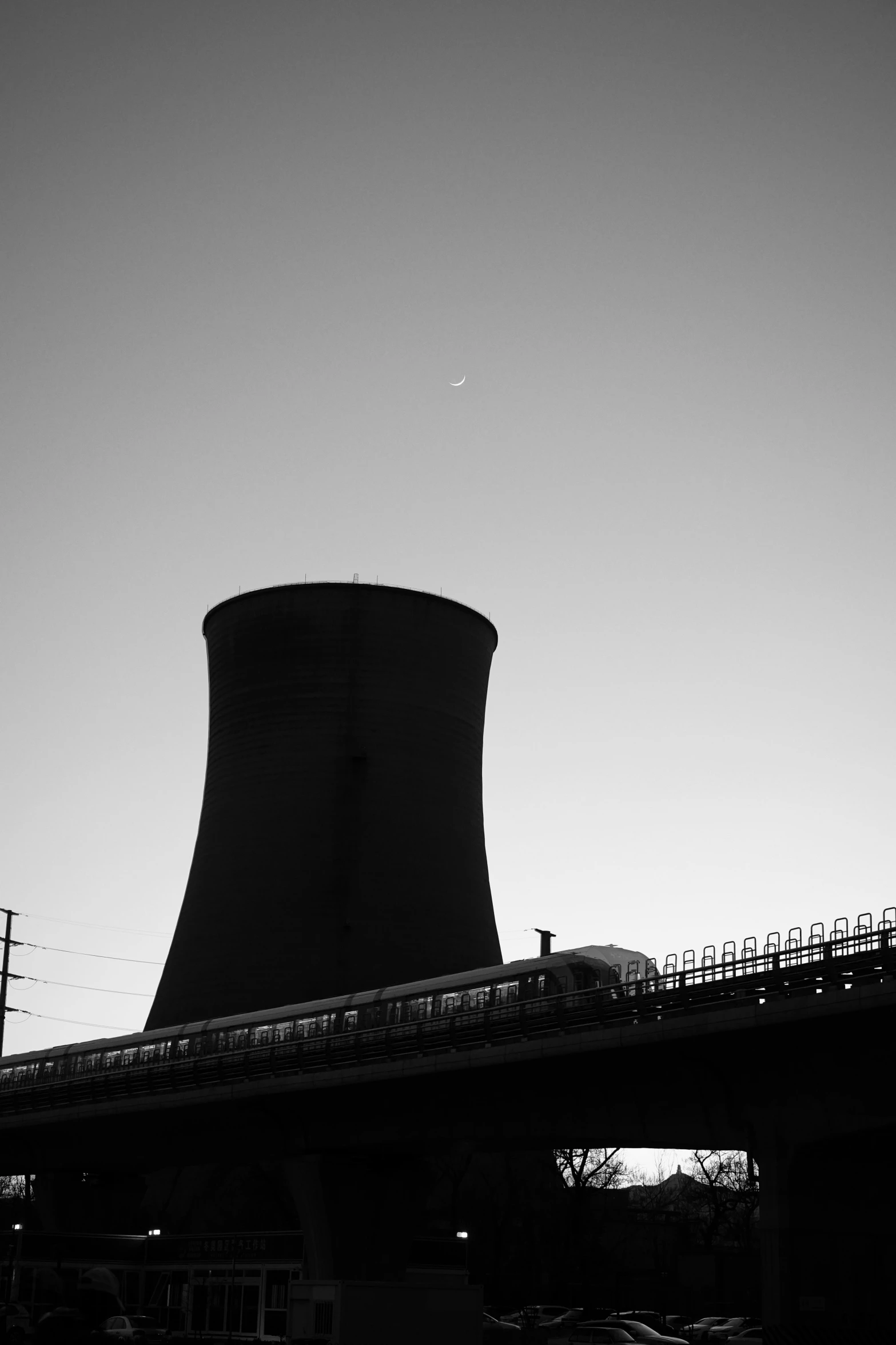 a large smokey tower with lots of windows on top