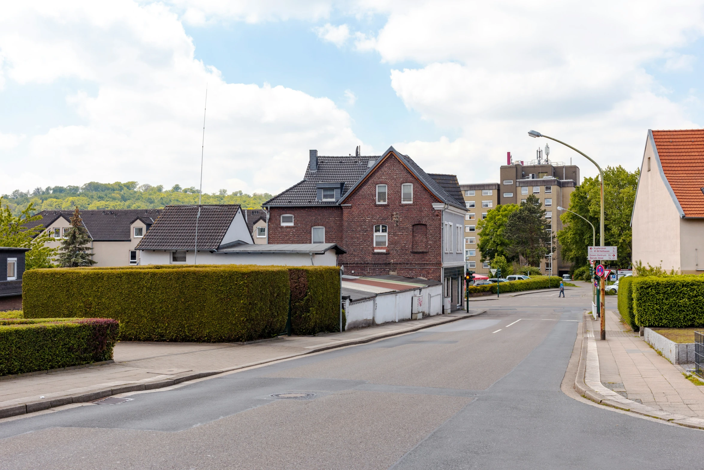 two identical buildings are seen in this quiet neighborhood