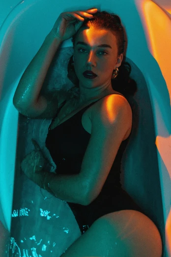 a woman is relaxing in a bath tub