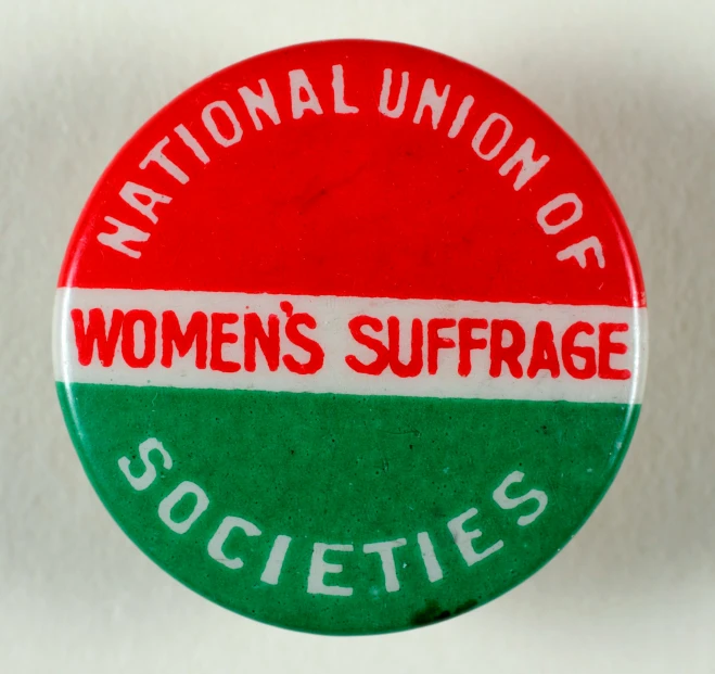 a red and green badge with white writing