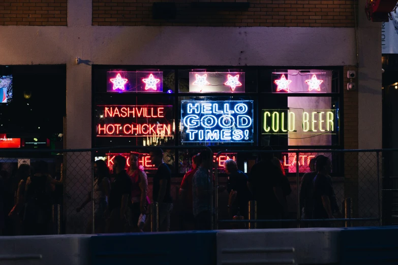 the neon signs are showing for the night time