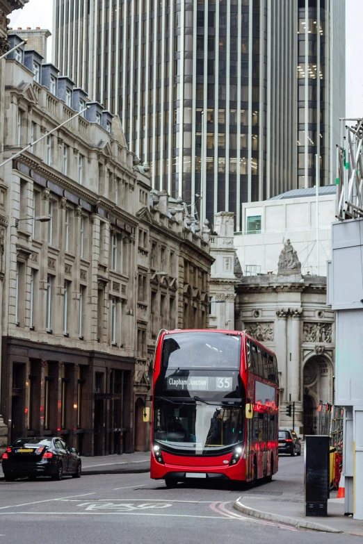 a city bus that is going through some city streets