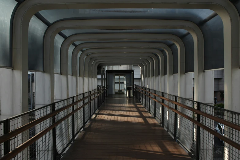 an archway with some metal hand rails and rails