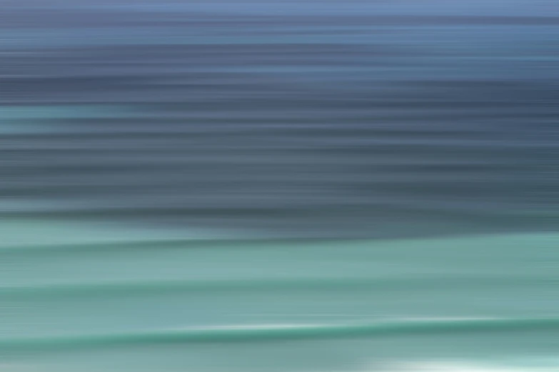 a bird flies over the beach as it stands near the ocean