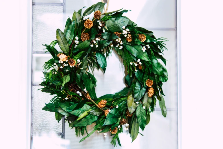 a wreath that is hung on the door