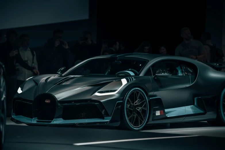 the bugatti chiron on display at night