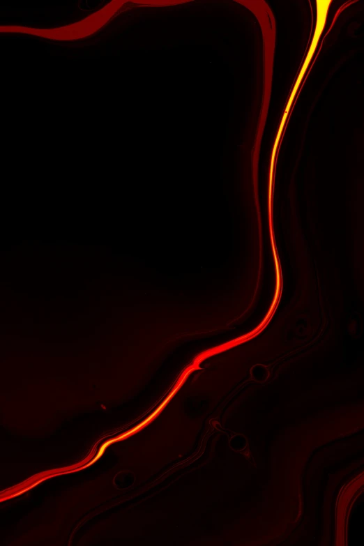 a yellow background with red and orange lights in the dark