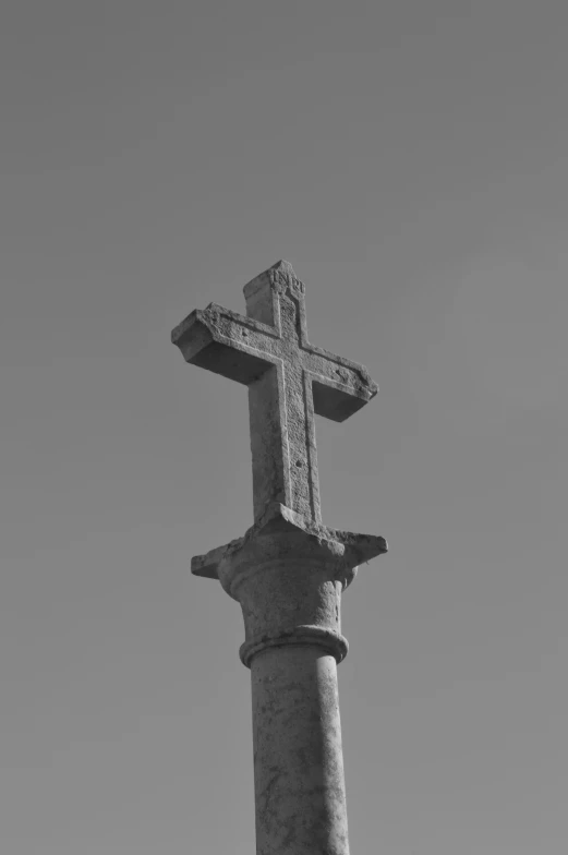 a tall cross on top of a large cross